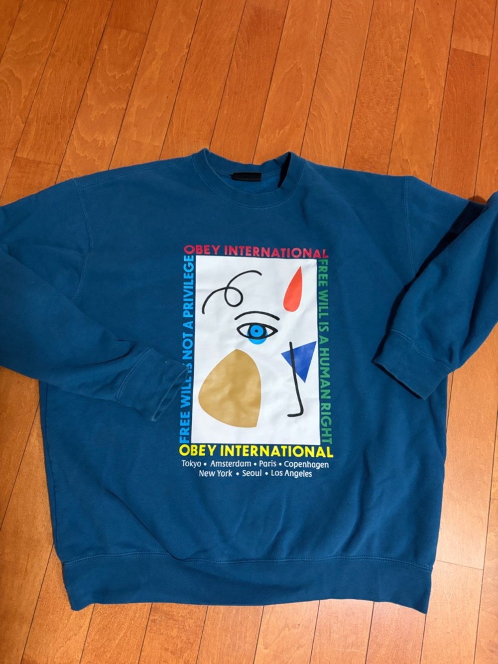 Obey Teal Crewneck Sweatshirt with Multicolor Graphic